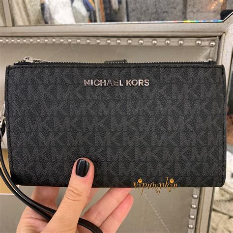 michael kors jet set travel large pvc wristlet in black|Jet Set Travel Large Clear Vinyl Wristlet .